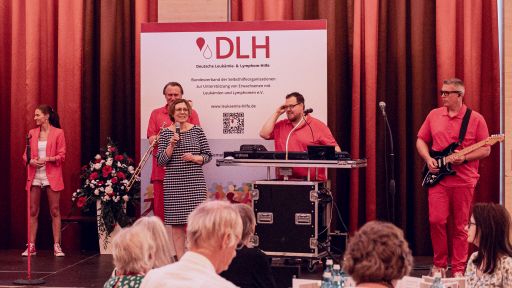 Ankündigung des musikalischen Abendprogramms: Die Band "Kölsche Adler"